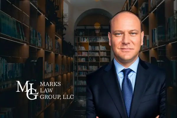 aaron of marks law group in library