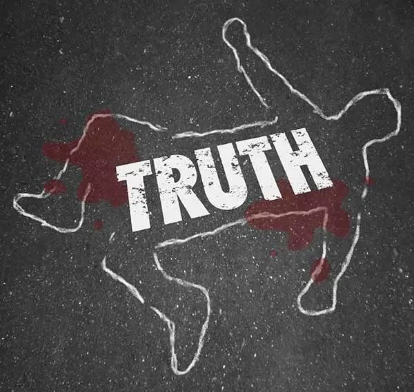 chalk body outline and blood stains on asphalt with the word "TRUTH"