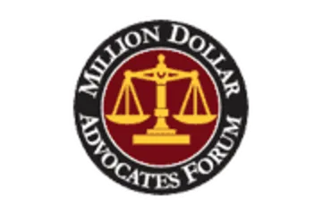 Million Dollar Advocates Forum seal with gold scales of justice