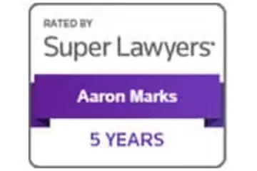 Super Lawyers badge naming Aaron Marks, rated five years
