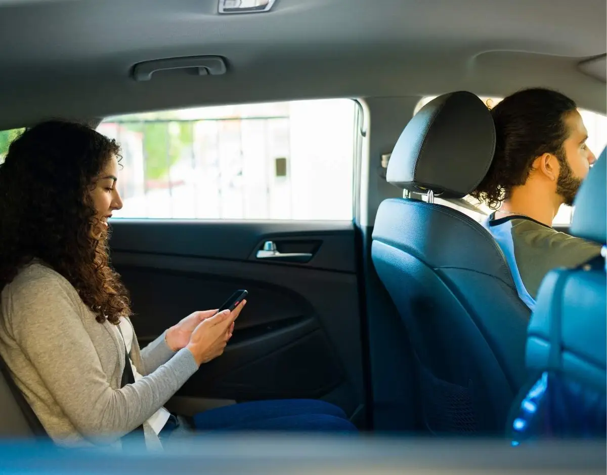 Lyft ride, passanger in the back seat and the driver