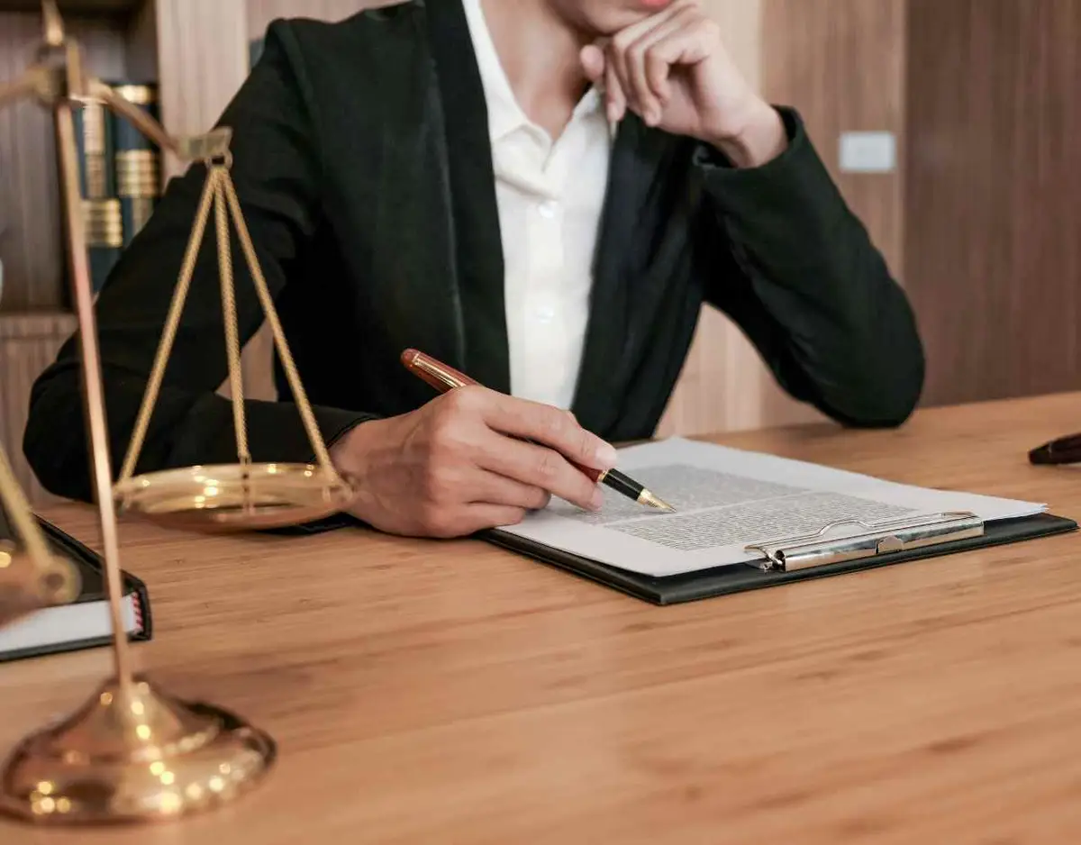 an attorney at a desk preparing for a deposition
