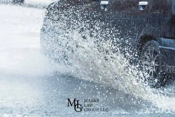 a car driving through standing water