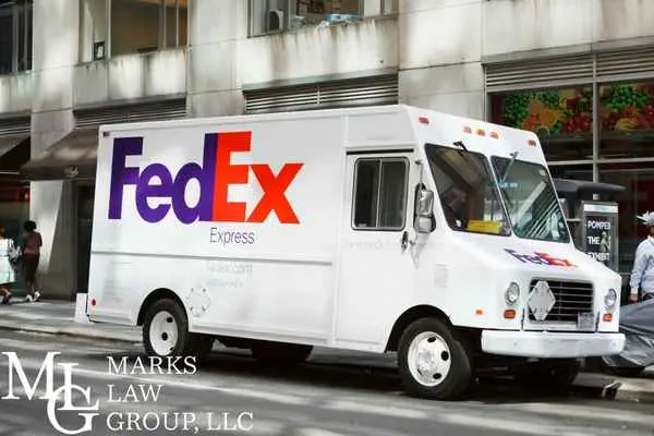 FedEx Express delivery truck parked on a city street