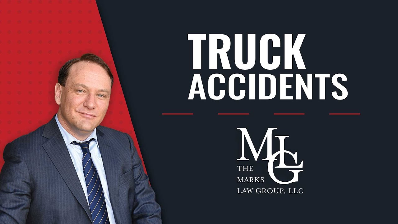 Video title card reading Truck Accidents beside a smiling man in a dark suit