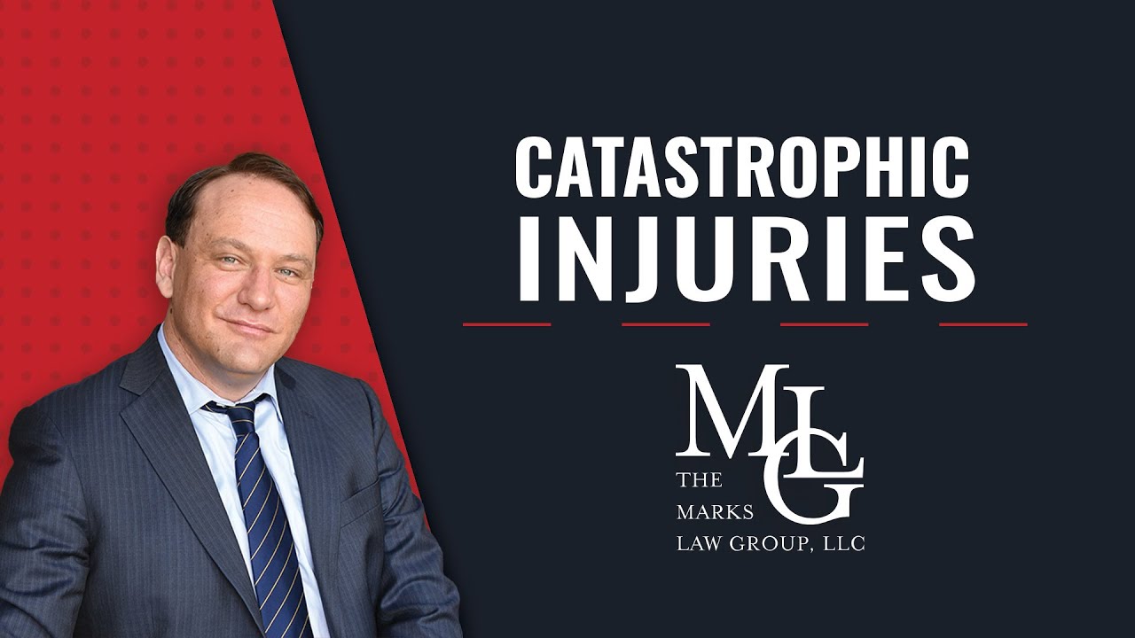 Video title card reading Catastrophic Injuries beside a smiling man in a dark suit